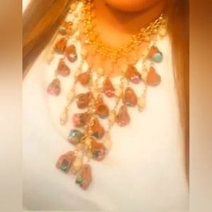 Collar de palma con taza de barro